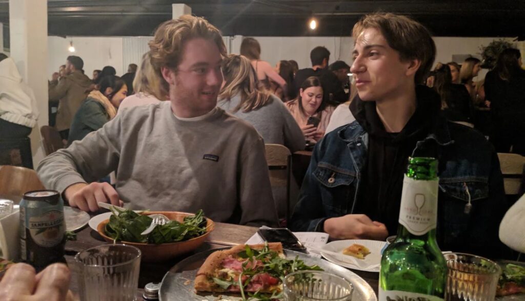 Guests dining together at a function at Neighborhood Pizza and Pasta